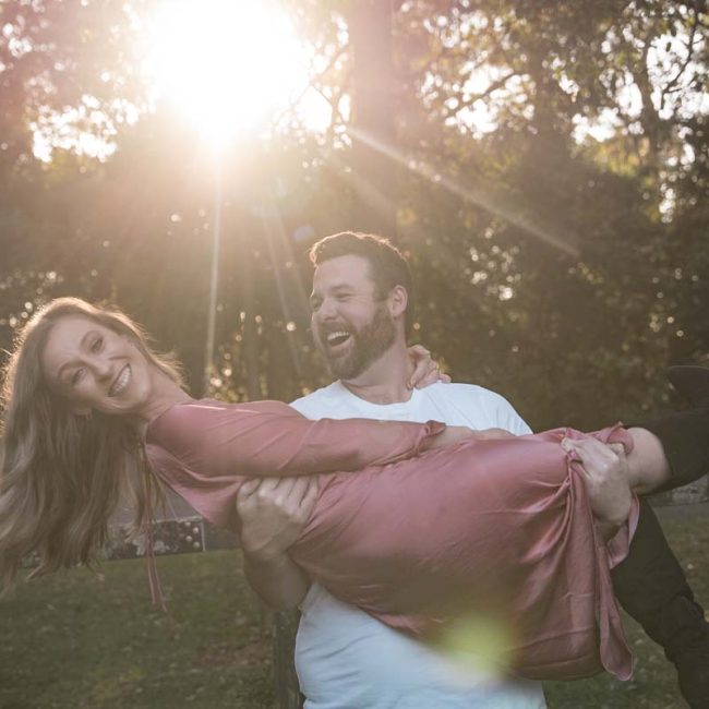 Engagement Photography man lifting women